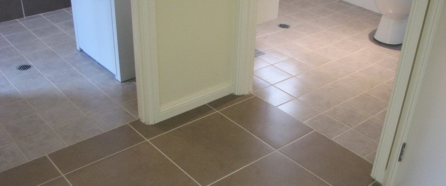 Tiled bathroom floors with no steps